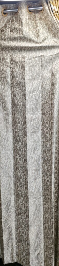 Premium beige textured made-to-measure custom curtains with elegant abstract woven design for luxury modern interiors.
